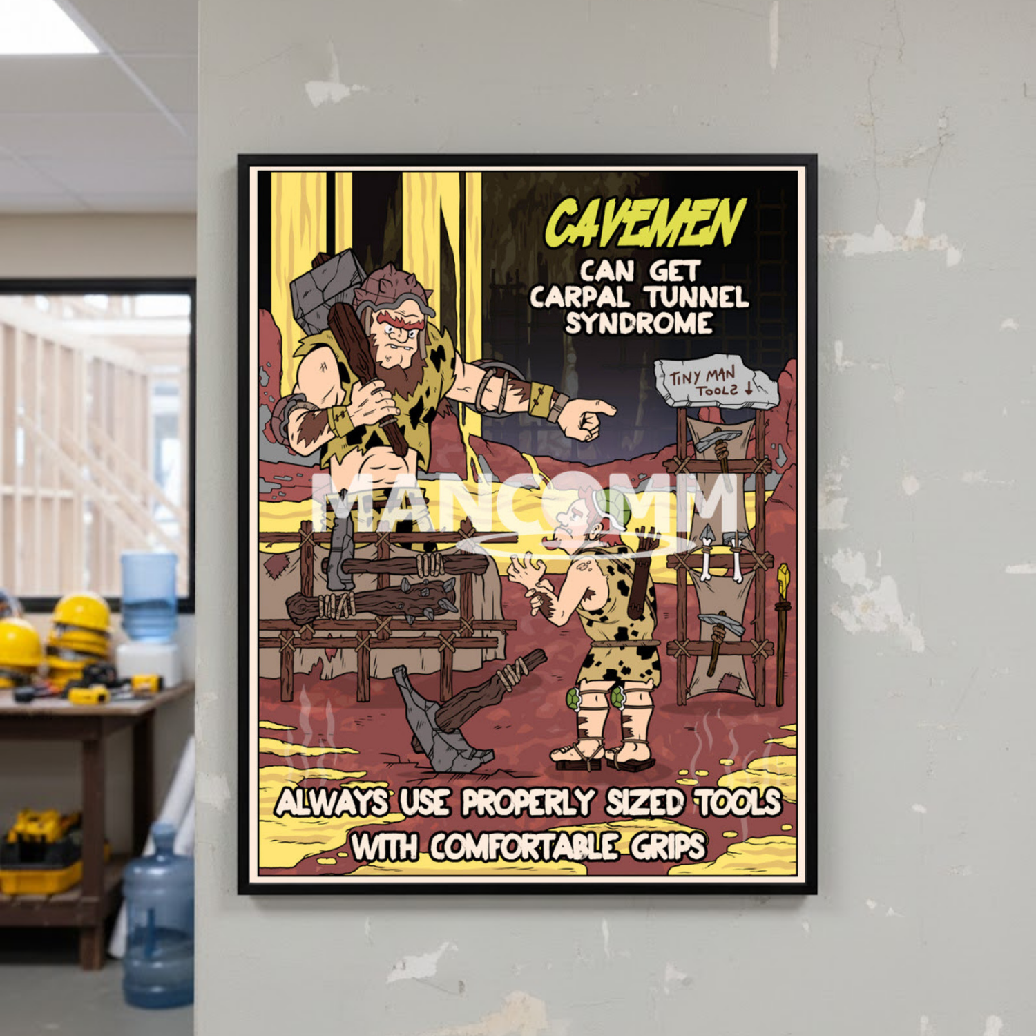 Cartoon poster with a caveman character and text on a gray wall.