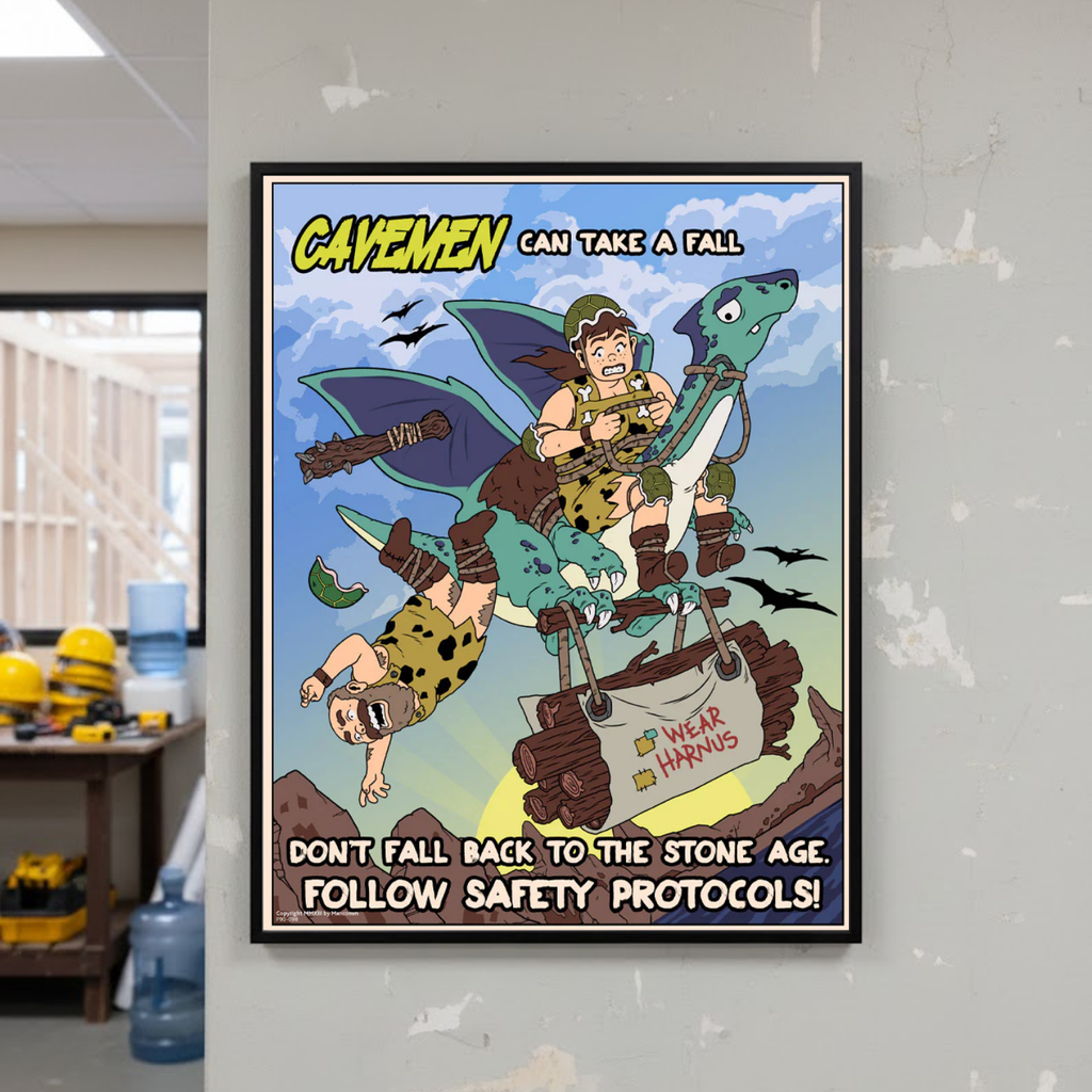 Cartoon poster with cavemen and dinosaurs on a wall in an office setting